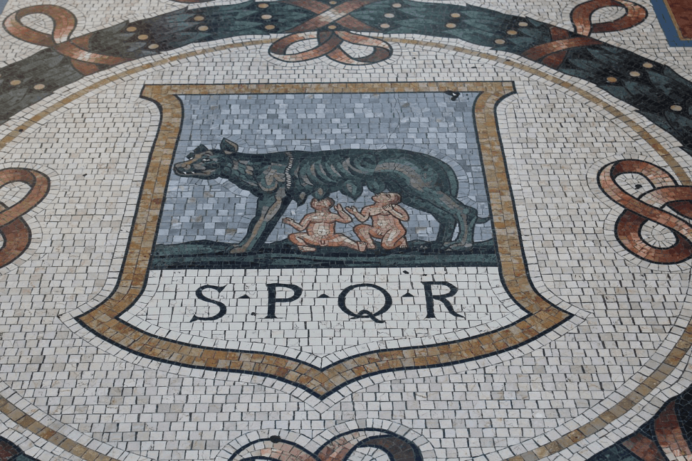 A Roman floor mosaic featuring Romulus and Remus