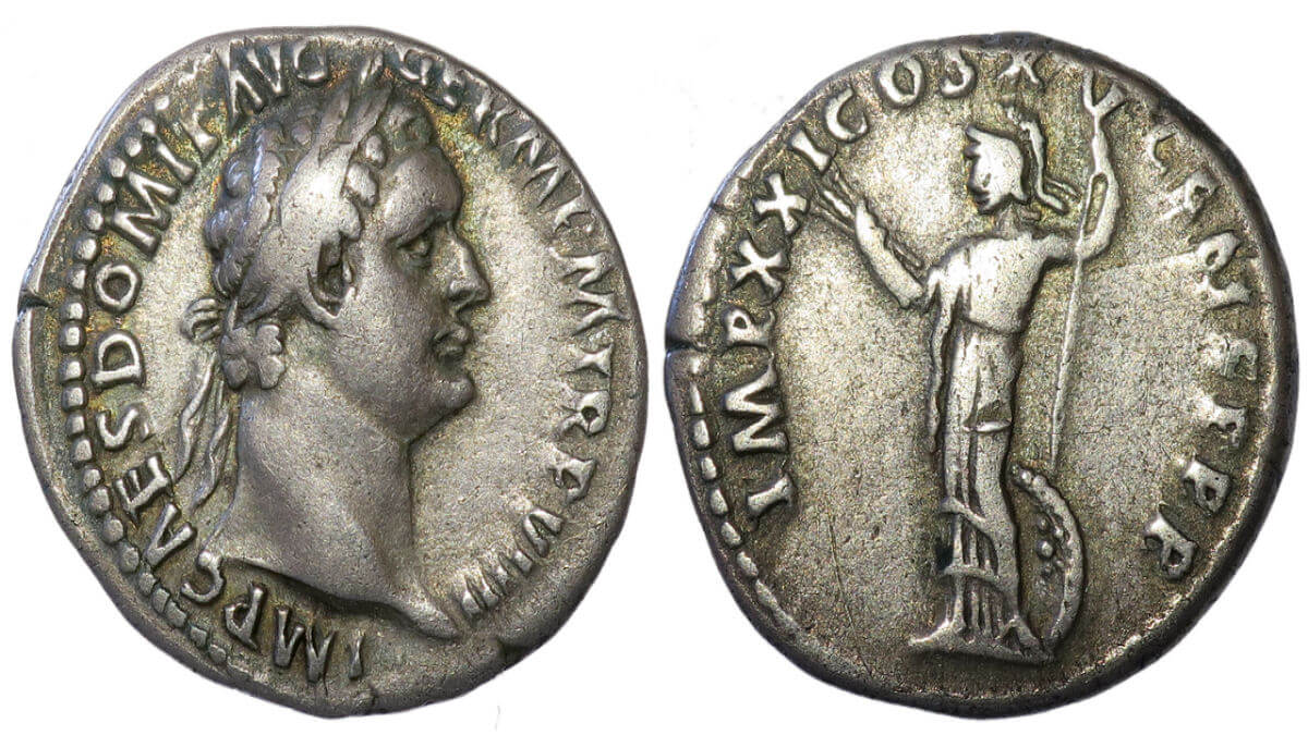 A silver denarius coin featuring Emperor Domitian on one side and Minerva on the other