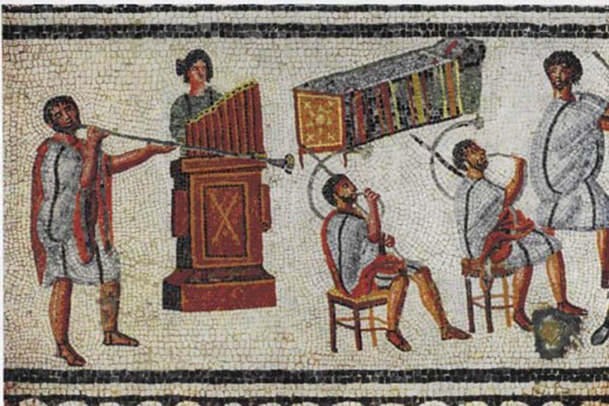 Musicians playing a Roman tuba, a water organ (hydraulis), and a pair of cornua, detail from the Zliten mosaic, 2nd century AD