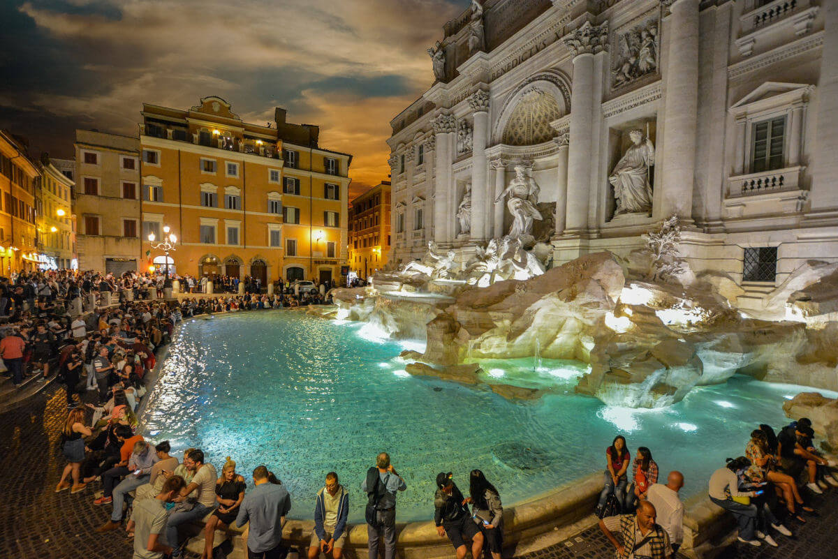 The Trevi Fountain in Rome lit up at night